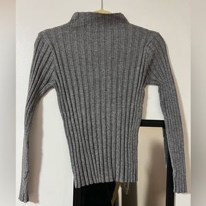 Assortment of Turtlenecks and Sweaters